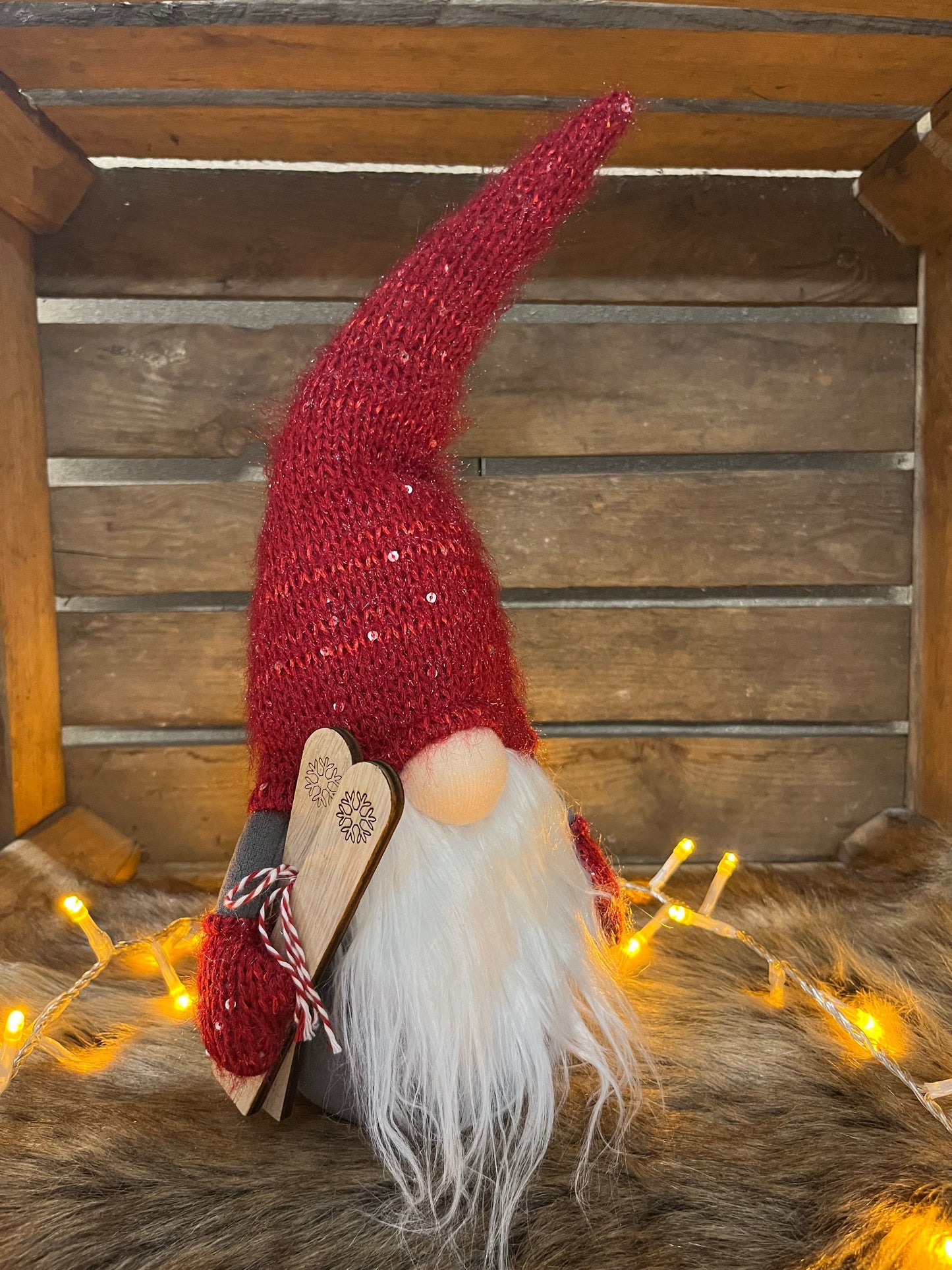 Wichtel Pauly decoration in red hat, polyester mix, 36cm.